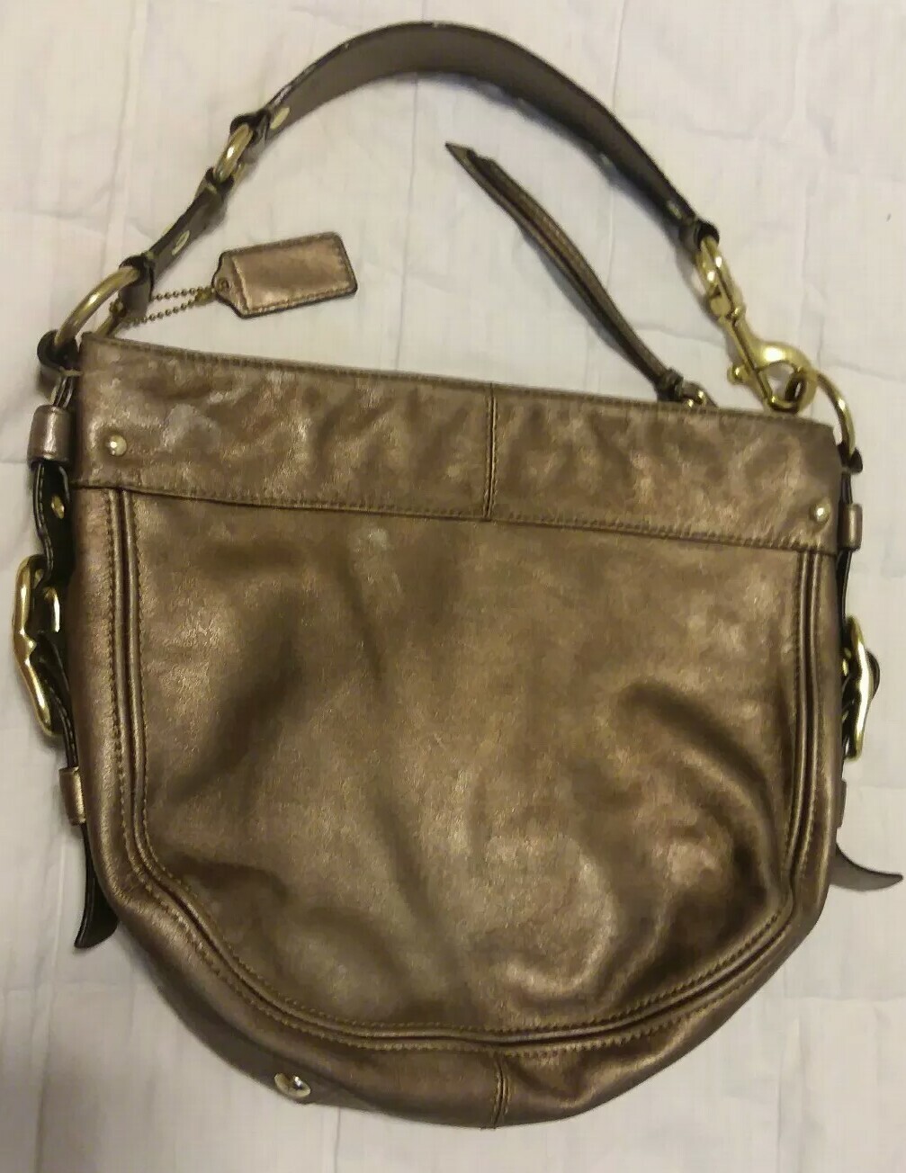 bronze coach purse
