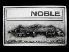 MI19165 NOS VINTAGE 1981 NOBLE MIX-N-TILL TRACTOR BELT BUCKLE