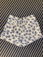 Vintage Woman  s Daisy Print Button up Denim High-Waisted Shorts