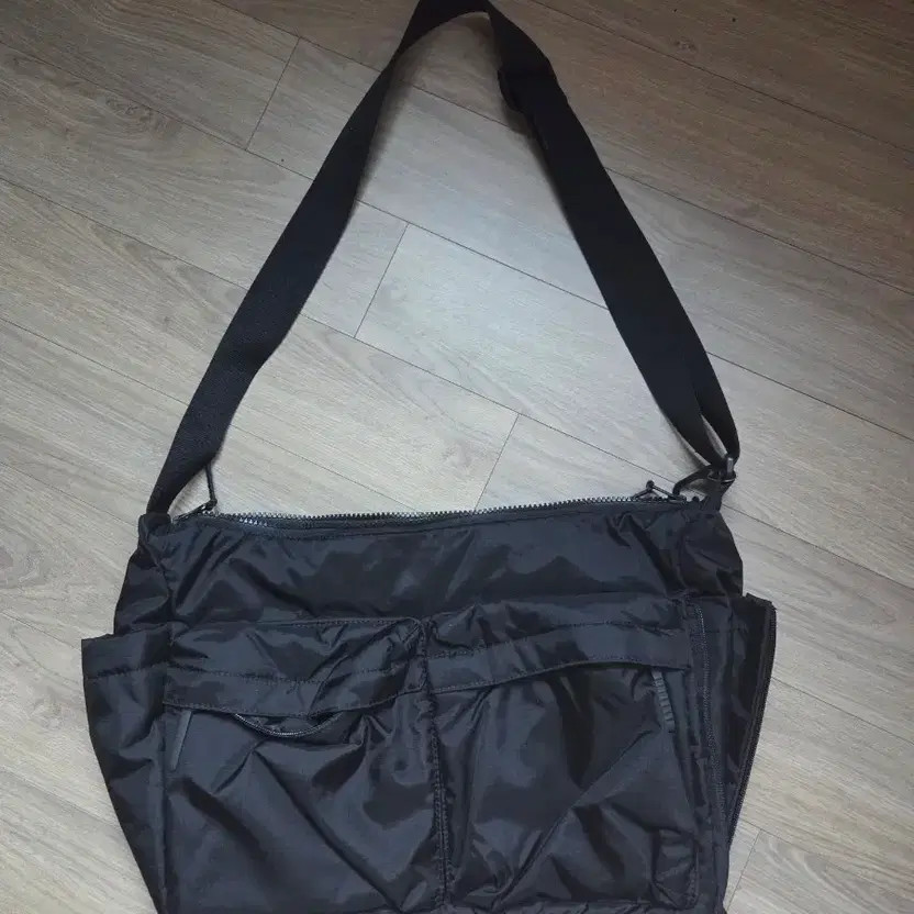 Uniqlo Black Crossbody Bag - Spacious & Stylish
