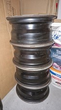 4 BMW Stahlfelgen 15 Zoll mit Radkappen - 195/65R15 von E46 Limousine