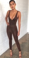 House of CB Pasqua Bronze Jumpsuit, a sleeveless, shimmering metallic knit...