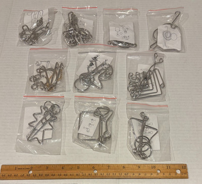 10 Different Steel Metal Entanglement Puzzles w/Instructions New & Sealed LOOK!