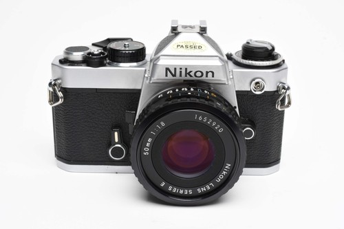 Nikon FE 35mm SLR w/50mm f1.8 E , Strap, New Seals, Case, Great!!