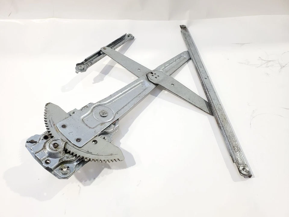 Regulador de ventana de puerta delantera izquierda usado se adapta a: Toyota Tacoma 2008 manual delantero Foto 2 de 4