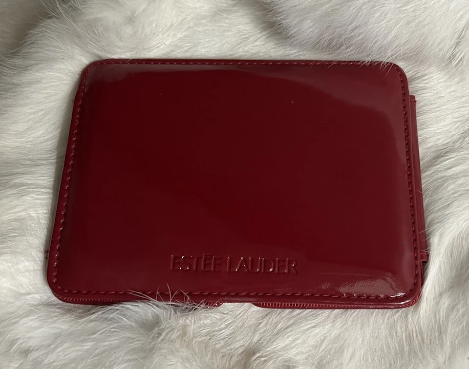 Bolso sin asas cosmético Estée Lauder cinta roja charol con espejo a juego Foto 3 de 4