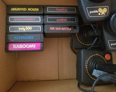 ATARI 2600 Games (8 Untested) Space Invaders Asteroids w/Paddles Joysticks