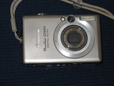 Canon Digital ELPH SD600 6.0MP Camera w/ Charger + 2GB Sd Card -2 batteries