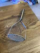 Vintage Flint Arrowhead- USA Stainless  Masher 9.25"