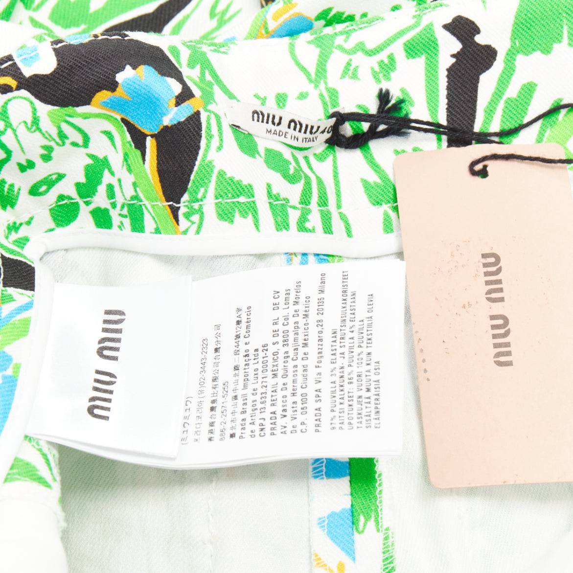 MIU MIU 2018 Runway green multi giraffe print feather hem flared