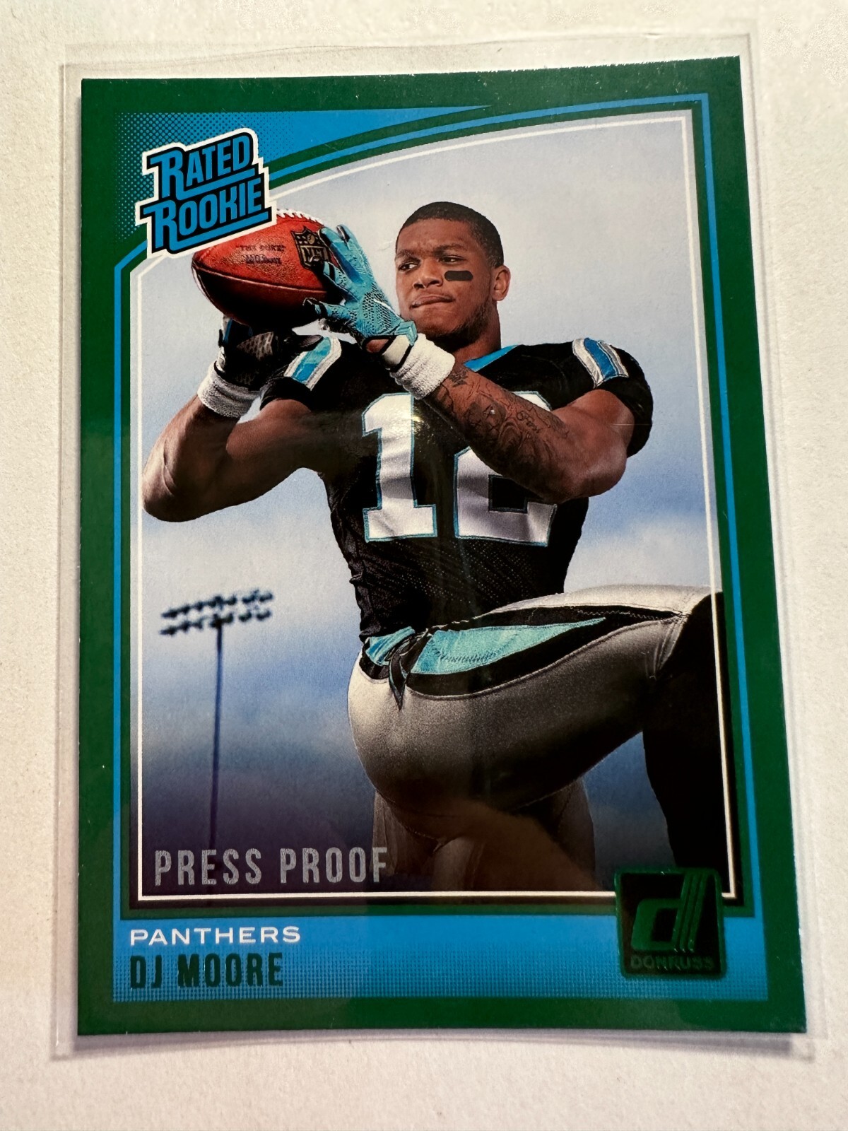 K21,073 - 2018 Donruss Press Proof Green #316 D.J. Moore RR