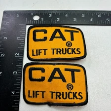 Vintage c 1970s or 80s CATERPILLAR EQUIPMENT CAT LIFT TRUCKS Patch Lot Of 2 00.Q