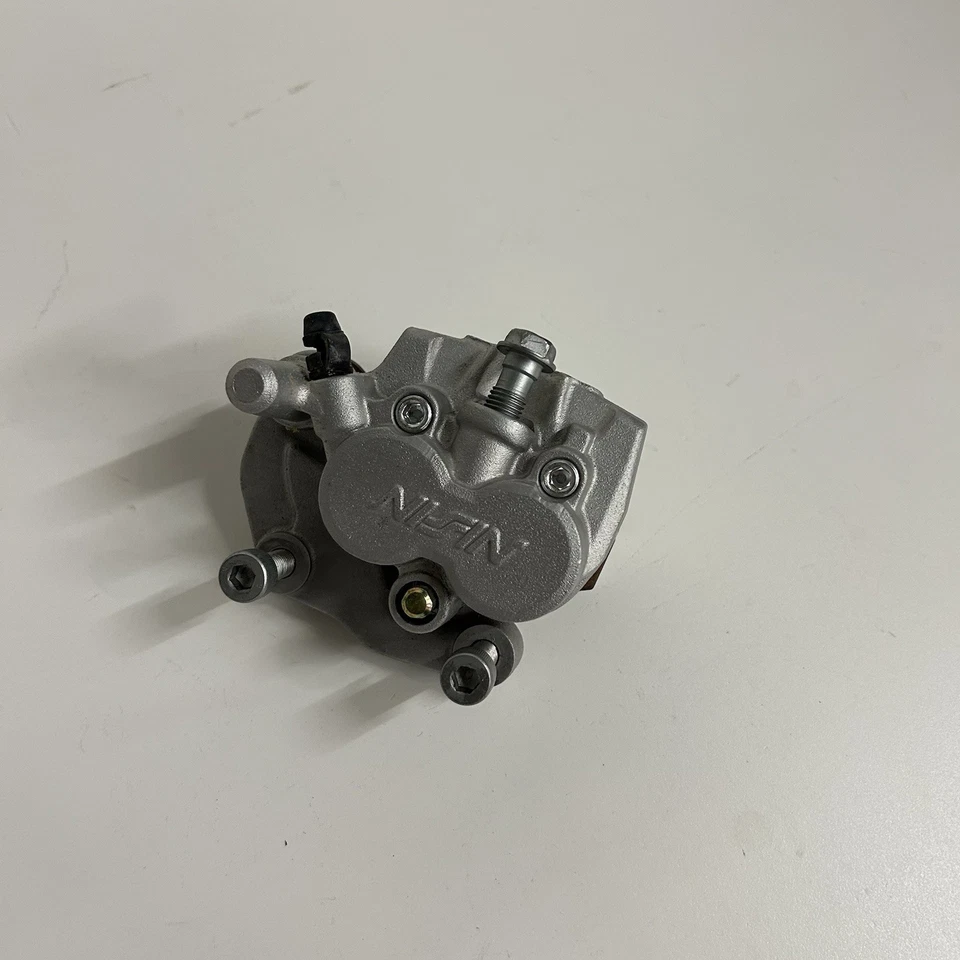 Kawasaki KX125 KX 125 1992 pinza de freno delantera reconstruida con pastillas nuevas OEM  Foto 2 de 4