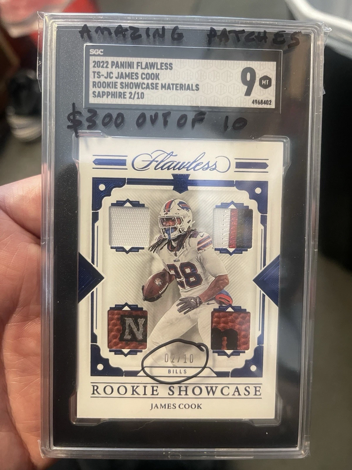 James Cook Panini Flawless Rookie Showcase Materials #TSJC Sapphire