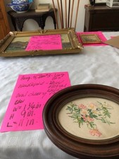 One Floral Needlepoint encased in an Oval Cheery Wooden Frame