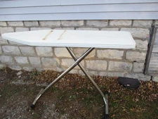 VINTAGE 1968 ROLLING CHROME LEG IRONING BOARD W/VINTAGE COVERS (3).