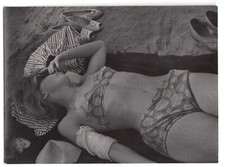 Beach Pretty young woman 23yo hiding face Beauty bikini Injured arm Shoes photo