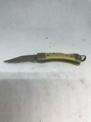 VINTAGE SCHRADE 511 SC USA RACCOON SCRIMSHAW LOCKBACK POCKET KNIFE