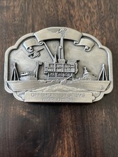 1983 HALLIBURTON OFFSHORE SYSTEMS WORLDWIDE OILFIELD BUCKLE NOS