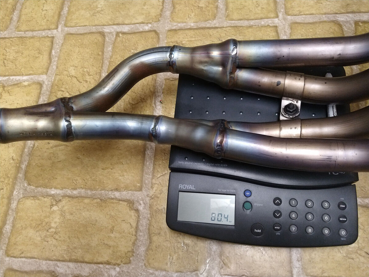 03-04 Suzuki GSXR1000 OEM Titanium Exhaust Header 40F0A18G1A 03-04 Suzuki GSXR1000 OEM Titanium Exhaust Header 40F0A18G1A