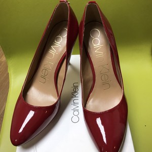 red calvin klein pumps