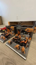 Bburago 1:43 Formula Racing Paddock Set McLaren F1 OP81 X LN4