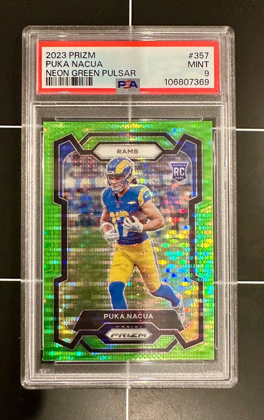 2023 Panini Prizm Puka Nacua #357 RC Neon Green Pulsar PSA 9