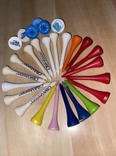 vintage golf tees and markers from the 1970s and 80s