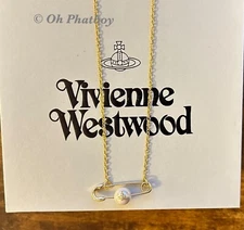 Gold Safety Pin With Pearl Orb Pendent Necklace.