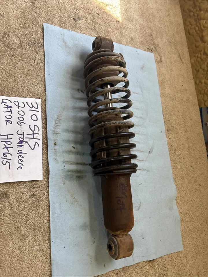 Amortiguador trasero izquierdo John Deere Gator HPX 615 2006 310 Foto 2 de 4