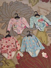 NWT Lot Of 4 Baby Girl's Character And Princess Swimsuits Size 12M, 56 Value