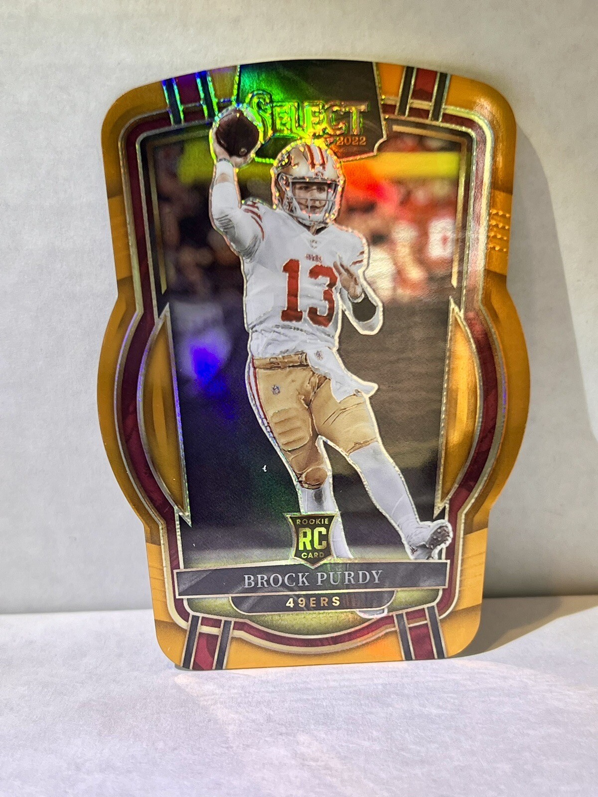 2022 Panini Select Brock Purdy Orange Prizm Die Cut /199 Rookie RC #213