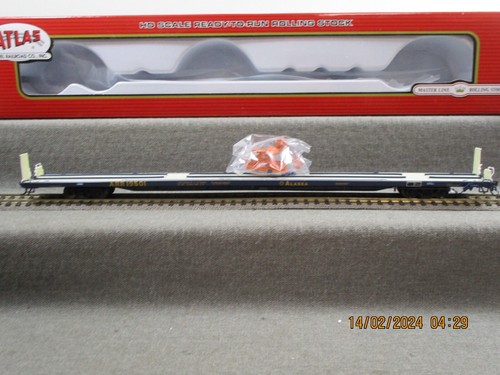 Atlas H0 20 003 694 89'4 Flat Car (Mid/End Hitches) Alaska Road 19501 in OVP | Zustand: Gebraucht