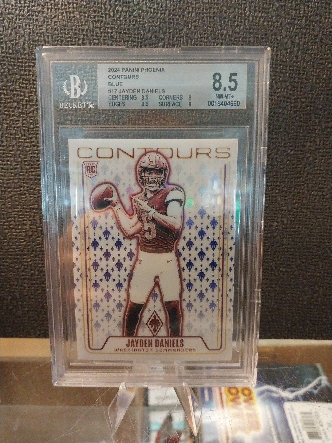 2024 Panini Phoenix - Contours Jayden Daniels #CON-JDS Blue /50 (RC)