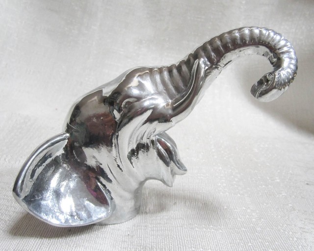 Topper car hood ornament Elephant bust with trunk up in a polished