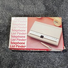 Telephone List finder never used. Advertisement printed on top RR