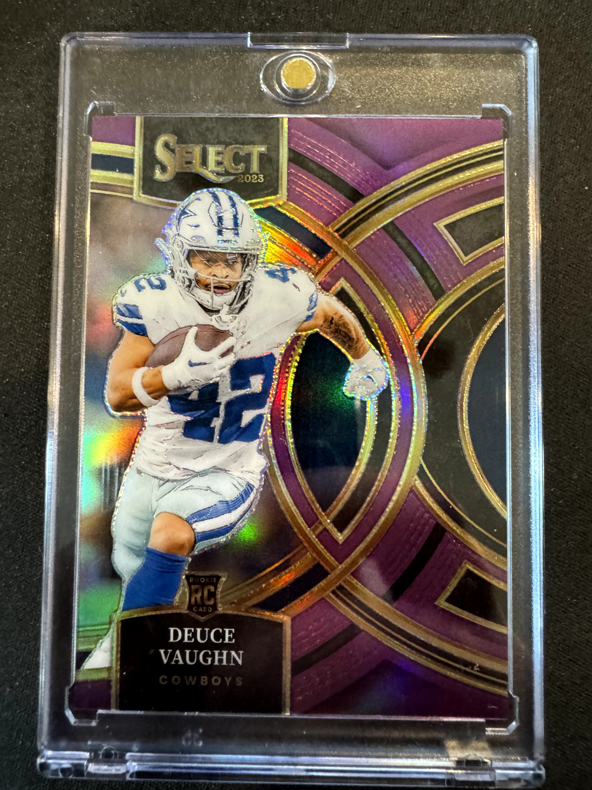 2023 Panini Select - Premier Level Purple Prizm #128 Deuce Vaughn /75 (RC)