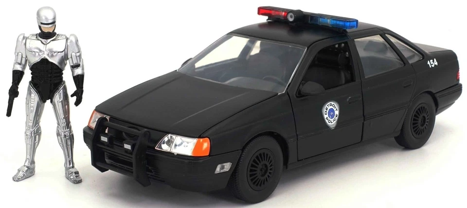 JADA TOYS, FORD Taurus avec figurine ROBOCOP noir 1986, échelle 1/24, JAD33743 - Photo 1/1