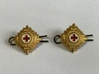 2 Genuine WW2 Red Cross Pips Cap Badges