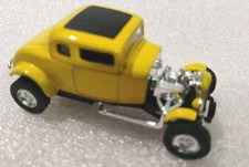 RV-MM LLC 2000 Diecast Yellow Coupe RARE