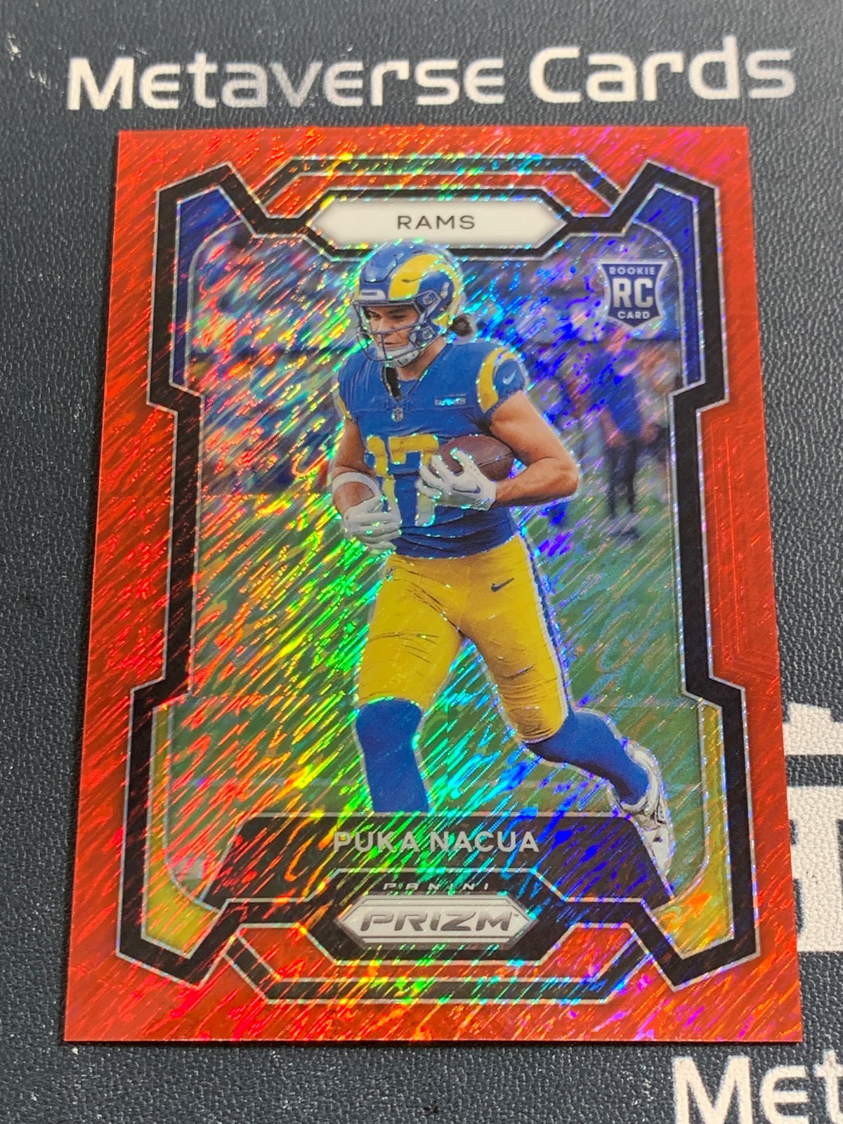2023 Panini Prizm Rookie Red Shimmer FOTL #357 RC Puka Nacua 21/35 Rams