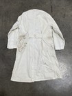 White vintage painters smock work wear with visible paint stains and textured fabric, made in USA.