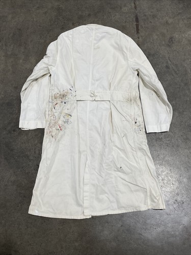 White vintage painters smock work wear with visible paint stains and textured fabric, made in USA.
