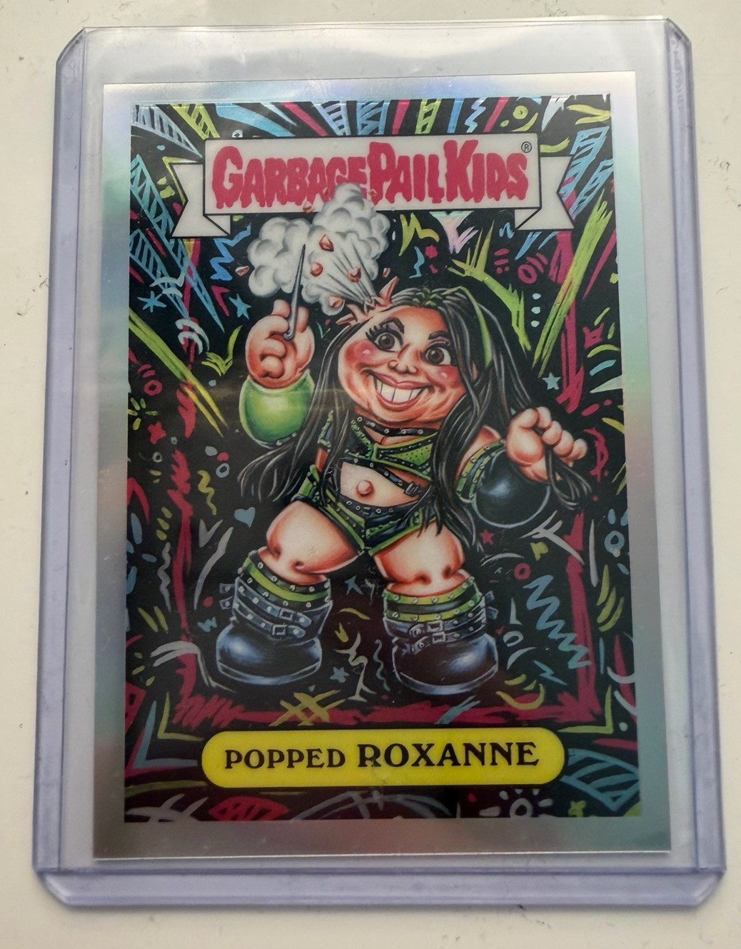 Popped Roxanne #GPK-RP 2026 Topps Chrome WWE GPK trading card — raw and PSA graded price guide