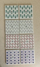 Nespresso 8pc Square Ceramic Coaster Set Non-Slip White/Multicolor Geometric