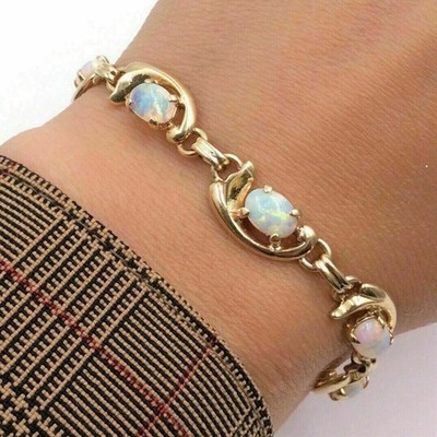 3 kt Ovalschliff Laborgefertigter Opal Damen Tennis Armband 14 K Gelbgold Finish