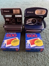 2 Polaroid 600 Cameras With Film