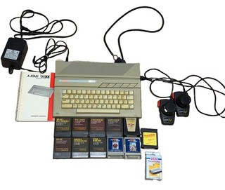 Atari 130XE Computer Lot Manual PSU 11 Games 2 Paddle Controllers Untested