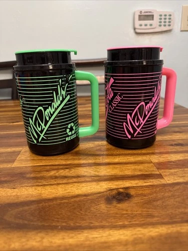 2 VTG McDonalds 1991 Green Pink Stripes Black Plastic Mugs Coca-Cola Neon