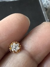 Golden nose pin